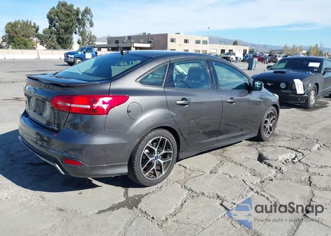2015 Ford Focus Se z USA, uszkodzony, nr VIN 1FADP3F25FL313842